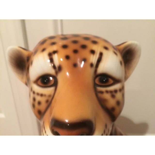 An exceptional and increasingly scarce vintage Italian ceramic cheetah family consisting of two adult cheetahs and one...