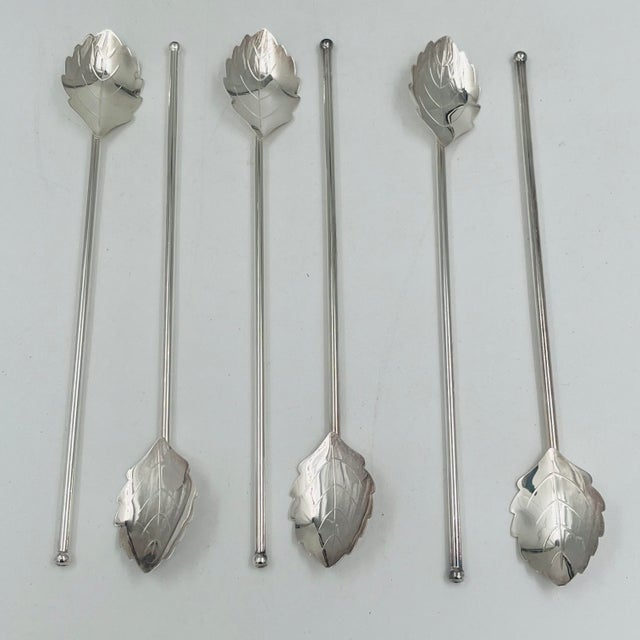 Gorgeous mid-century barware set. This set of six silverplate cocktail stirrer straws/sipper spoons was made in Denmark in...