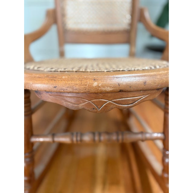 Early 1900s Colonial Revival Cane Rocking Chair With Burlwood Crest Inlay | Traditional Americana Rocker For Sale In Des Moines, IA - Image 6 of 9