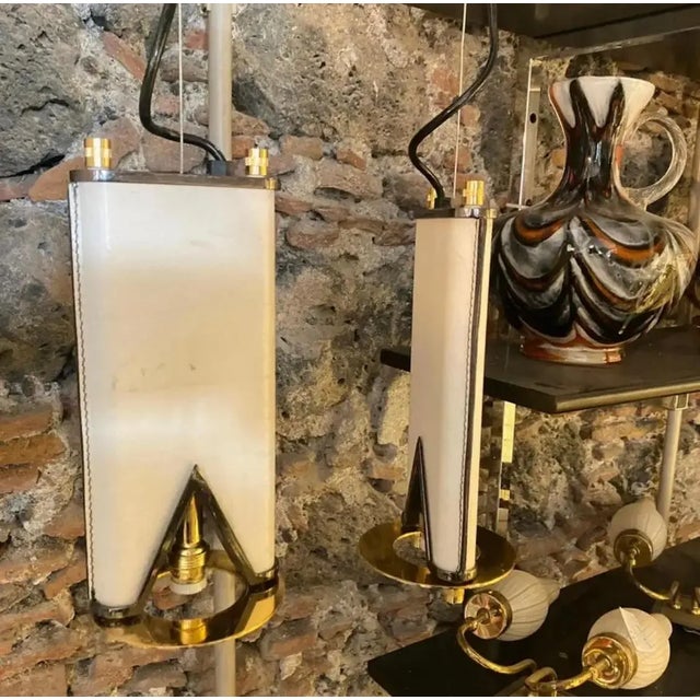 Brass An Elegant 1980s Mid-Century Modern Brass and Skin Italian Double Chandelier For Sale - Image 8 of 9