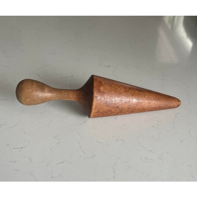 A beautiful rustic antique wooden utensil. These rustic kitchen pieces make gorgeous accents on modern day shelves.