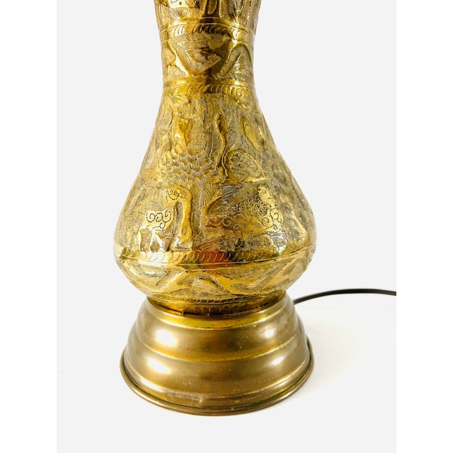 India import from 1950’s, brass hand-hammered pressed culture figurative design Asia motif. Excellent condition, note ding...