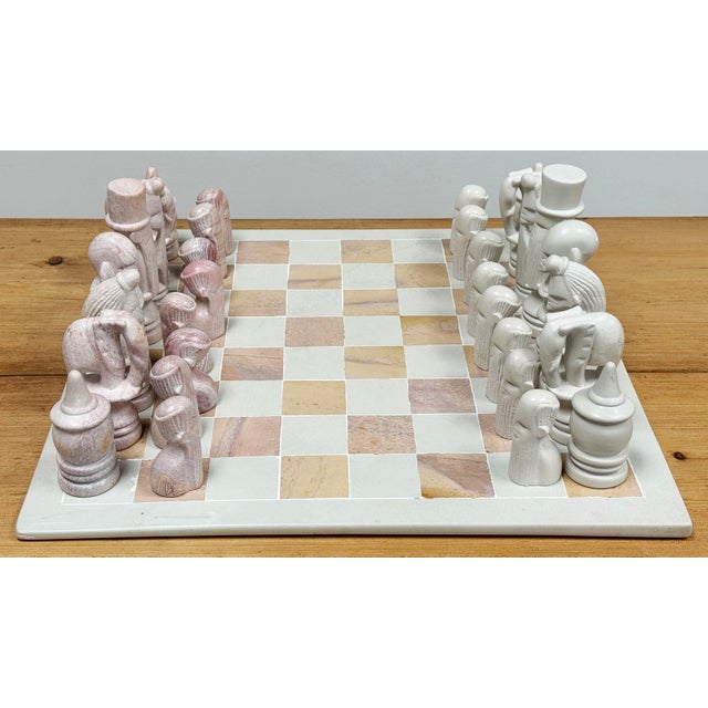 Vintage 32 piece carved soapstone African Maasai Tribe set with matching board. Board measures 15.75" square with tallest...