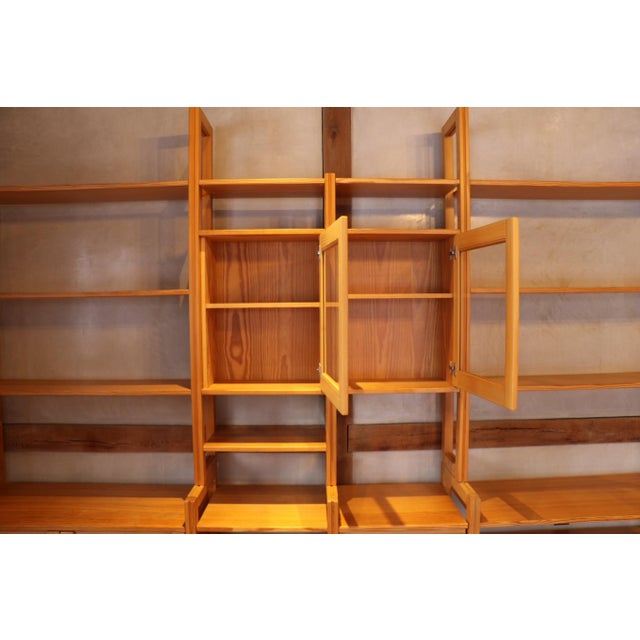 1970's Swedish Pine modular wall unit with glass-fronted cabinets and shelves. Reverse is pine, not mdf, so can also be...