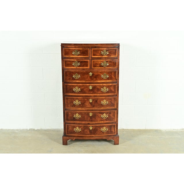 An exceptional Georgian or Chippendale style nine-drawer bow front highboy dresser By Henredon, "Aston Court" Collection...