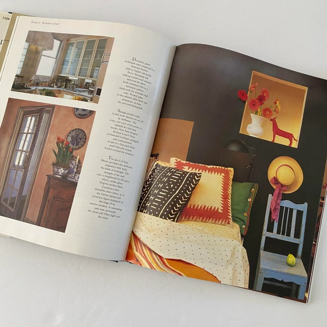Take a step back into the vintage modern design of the 1990s. This wonderful hardback 'Decorating Style' coffee table book...