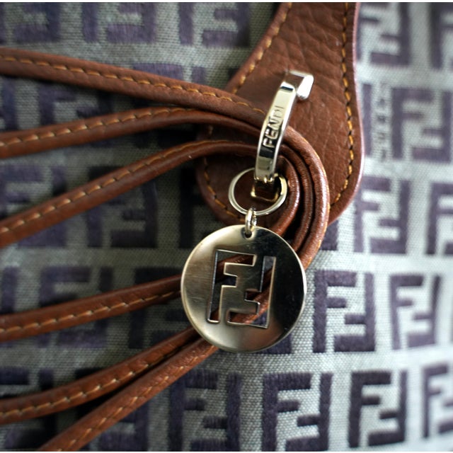 An iconic piece of Fendi history. This Zucchino Canvas Tote, produced in 2006, is a quintessential example of mid-2000s...