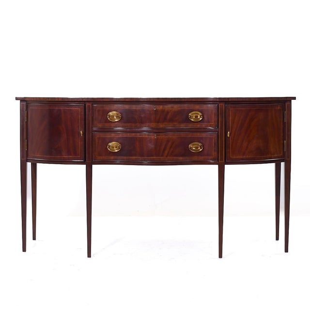 Henkel Harris Hepplewhite Style Inlaid Mahogany Sideboard This sideboard measures: 68 wide x 24 deep x 38.5 inches high...