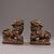 A pair of handcrafted Chinese wealth lions (fortune/guardian lions) cast in solid copper and finished in mottled gold with...