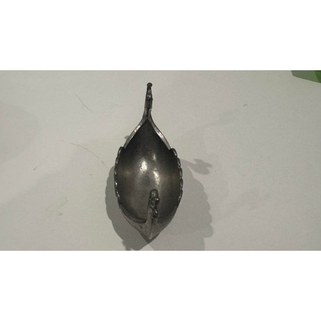 This miniature Norge Pewter Viking ship with spoon is elegant piece to serve your salt or spice in.
