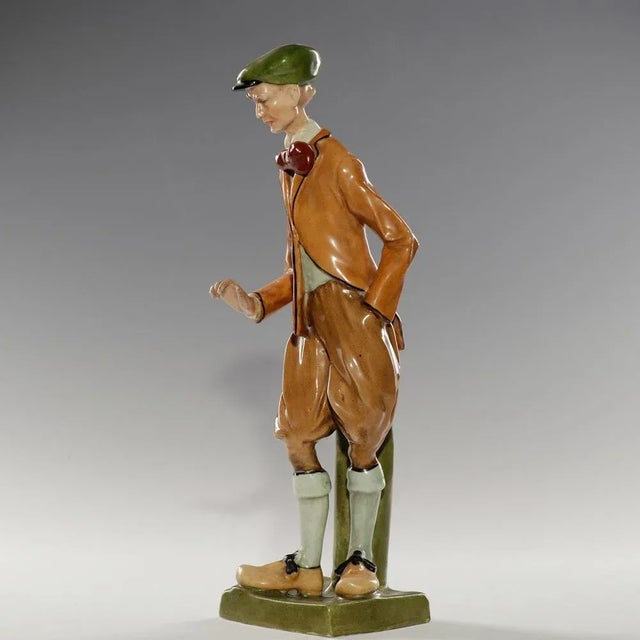 Antique pottery / ceramic figurine "Gentleman with monocle". Design by Elvir Otto & Eduard Stellmacher, about 1900-1901....