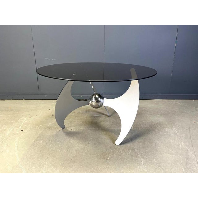 Vintage 'Helix" adjustable dining or coffee table designed by Luciano Campanini for Cama. The design makes it possible to...