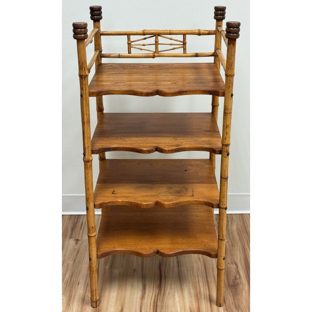 Vintage four-tier shelf made of bamboo with a rich burnt tortoise shell finish. Capped with unique carved wood knobs....