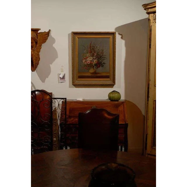 An Italian Rococo period framed still-life oil on canvas painting from the late 18th century, depicting a colorful...