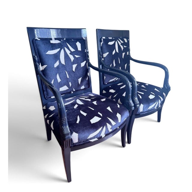 Regency style lacquered black chairs with new abstract upholstery. Neoclassical styling with dolphin and arrow motif make...
