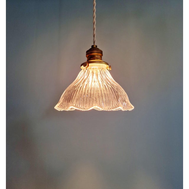 Art Deco Pendant Light in Transparent Grooved Glass from Holophane, 1920s, in Flawless conditions. Designed 1920 to 1949...