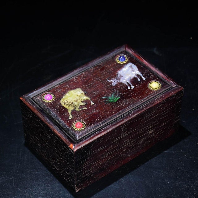 This beautiful box is a fine example of traditional Chinese mixed-media craftsmanship. The rectangular lid features a...