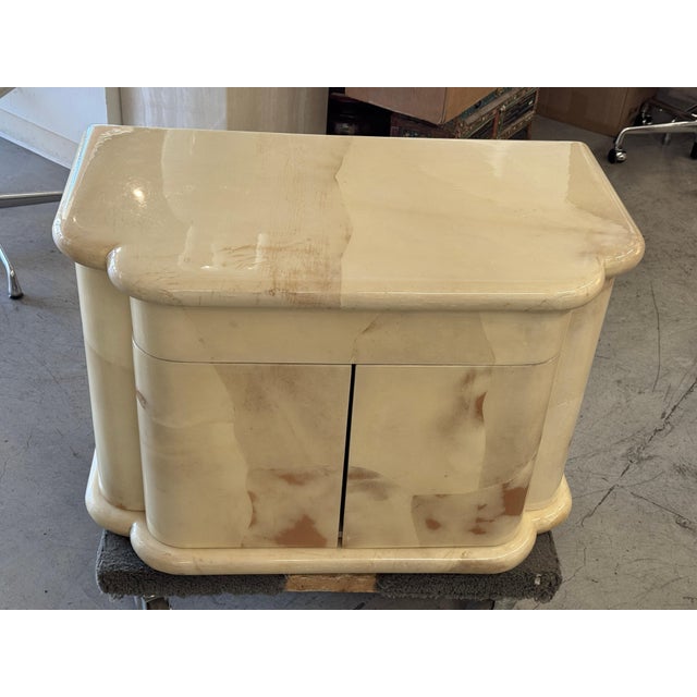 A nice pair of Goatskin nightstands designed by Enrique Garcel for Jimeco Ltda. of Colombia. The nightstands have one...