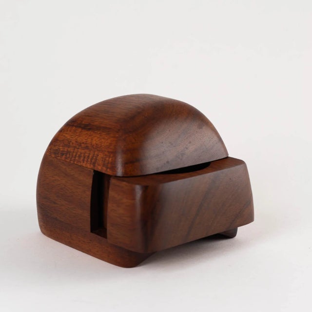 Mesmerizing vintage carved wood puzzle jewelry box with an organic rounded shape. Ingenious sliding compartment lined with...
