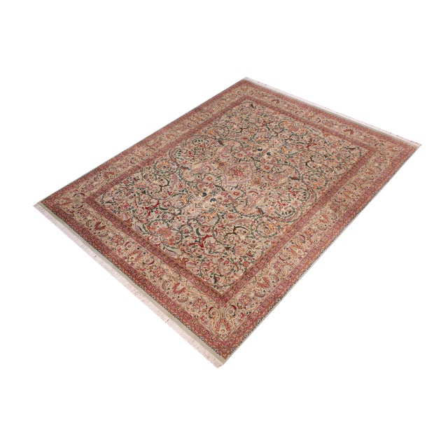 Designed with mesmerizing intricacy and gorgeous color palette, this hand-knotted masterpiece demonstrates the beauty and...