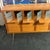 This Giorgetti sideboard and credenza features a warm wooden finish and modern frosted glass front doors. It offers ample...