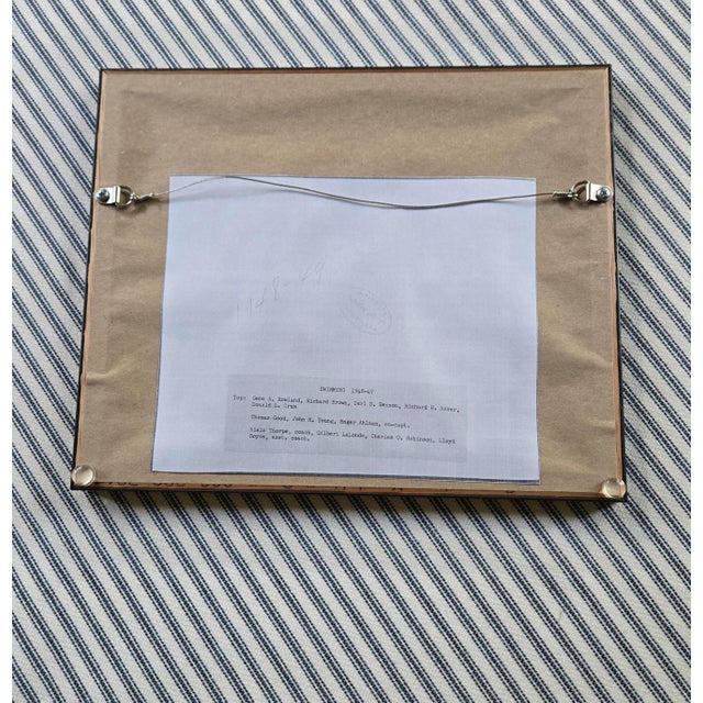 One of a series of antique University of Minnesota athletics team photographs. This is the U of M Men's Swimming Team of...