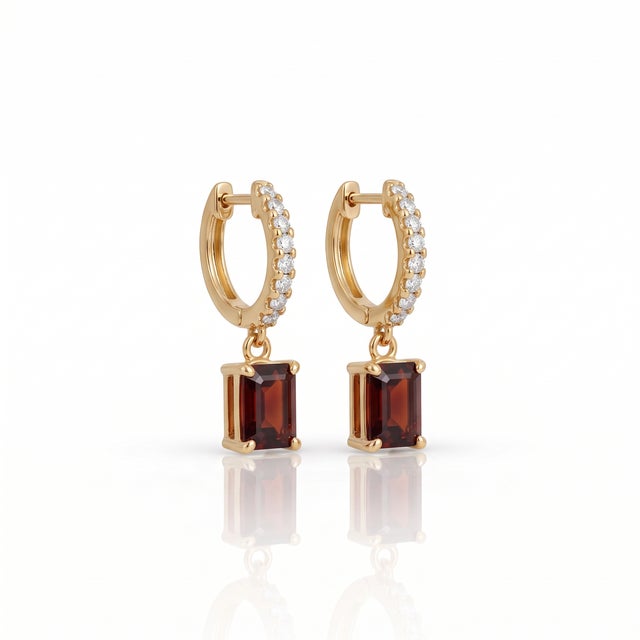 Elevate your daily ensemble with these breathtaking drop huggie hoop earrings featuring a sparkling pavé-set hoop and a...