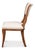 Swept saber legs and a curved crest rail follow the ancient Greek seating form, wrapping gently around the shoulders. The...