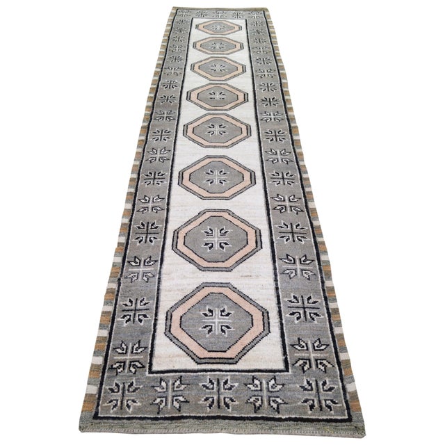 Traditional rug making techniques, this wool rug blends timeless craftsmanship with a modern approach to design. Each...