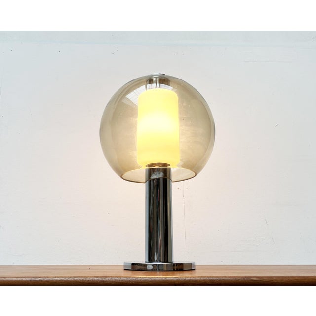 Large Space Age Globe table or floor lamp in chrome and glass. A functional light source and an impressive lighting...