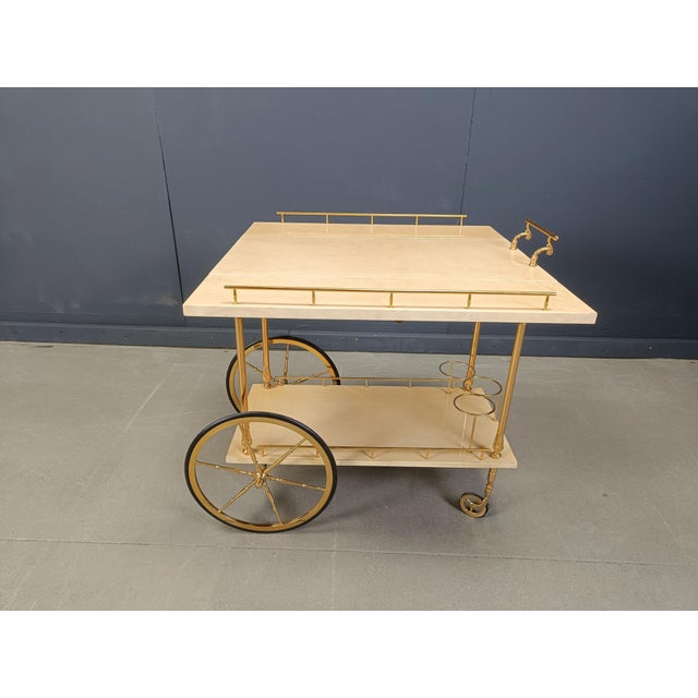 Italian Lacquered Serving Bar Cart by Aldo Tura, 1960s, in Good conditions. Designed 1960 to 1969 This piece has an...