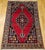 "Vintage Persian Mazgalan area rug, meticulously hand-knotted in the mid-1900s. Originating from the skilled weavers of...