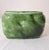 A striking vintage mid-century modern art pottery planter by Royal Hickman, marked with his name and the number 516. Known...
