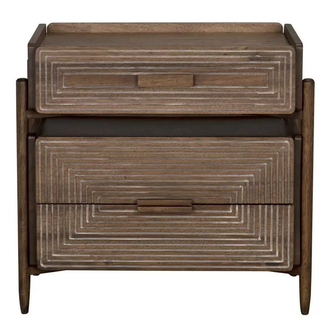 Contemporary, edgy, and quite simply exceptional, this side table is handcrafted of minimally finished walnut wood to...