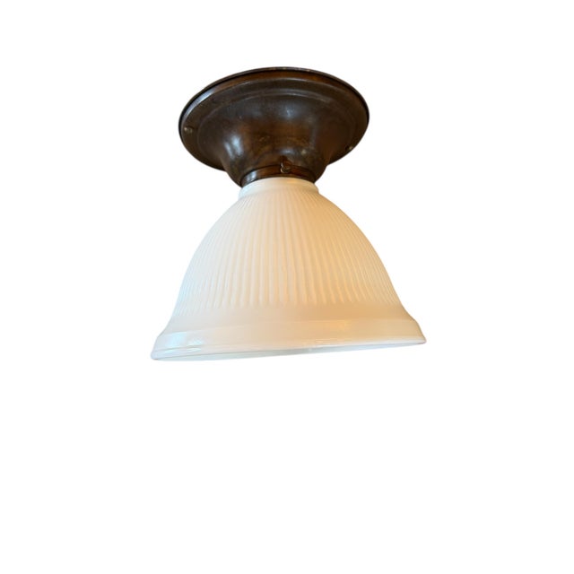 This signed Stiffel flushmount will look great in a kitchen, bathroom or any special nook. Ribbed milk glass looks great...