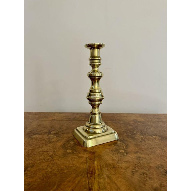 Large pair of quality antique Victorian brass candlesticks, having a large pair of Victorian brass candlesticks with...
