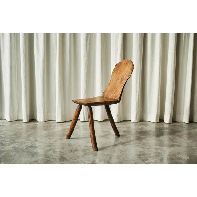 Primitive Wabi Sabi Carved Tripod Side Chair, Europe, 19th Century. This is a stunning antique tripod chair with the seat...
