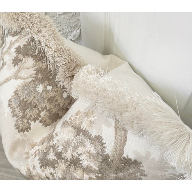 Verdure on the light side. This lovely embroidered fabric with it 's leafy towering trees, has a light and airy color...