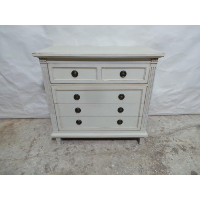 This is a unique 4 drawer Gustavian style chest of drawers. it was just restored and painted with Milk Paints "Oyster White"