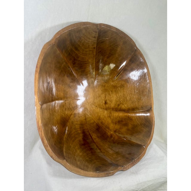 An exceptional, large-scale mid-century modern centerpiece bowl, masterfully hand-carved from a single block of premium...