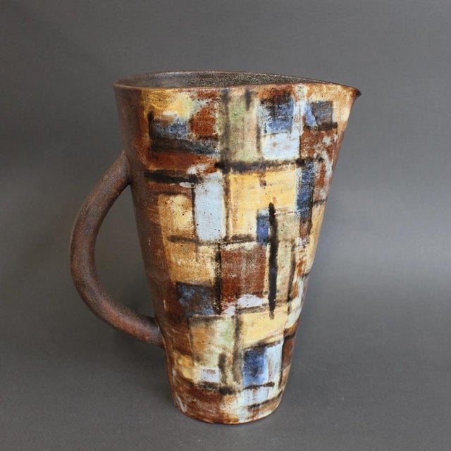 Vintage French ceramic pitcher / vase by Alexandre Kostanda, Vallauris (circa 1960s). In his trademark natural clay and...