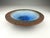 This beautiful bowl by Pieter Groeneveldt features a raw, unglazed surface on the exterior and rim, typical of...