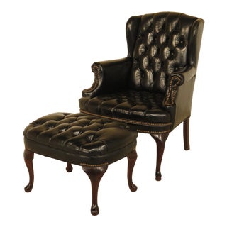English Tranditional Black Tufted Leather Wing Chair and Ottoman For Sale