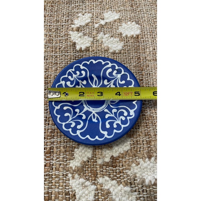 The Lidia Barth Tihany Petite Blue White Glaze Petite Wall Plate is a beautifully crafted piece of Hungarian pottery. The...