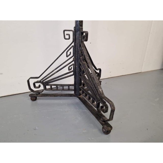 Art deco floor candlestick. Metal. Belgium. 1930s. Height 123cm; width 58cm; width 43cm