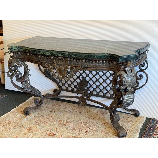 Design Plus Gallery presents an Iron Acanthus Leaf Console Table with Green Marble Surface. This ornate wrought iron and...