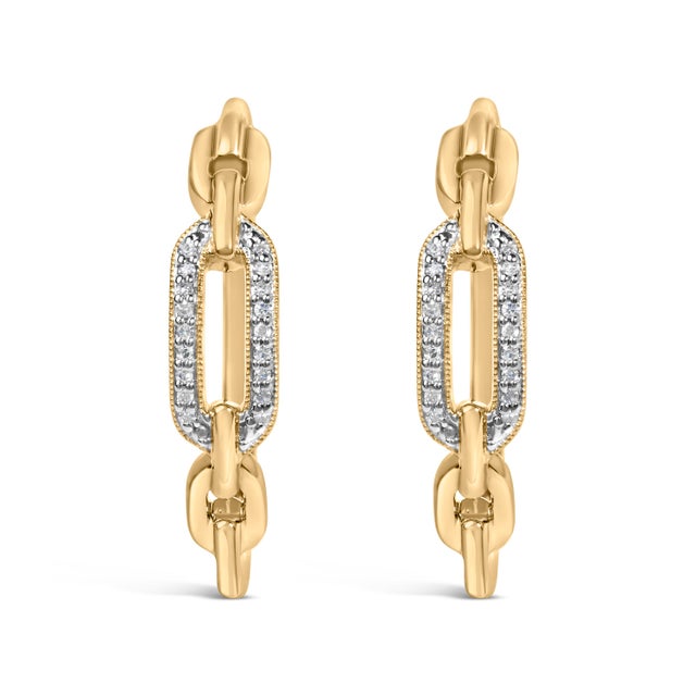 A glint of modern poetry for the ear, these paperclip-inspired hoops marry sculptural charm with everyday radiance. The...