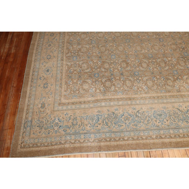 1920s Persian Tabriz Rug with an all over herati design with white and blue accents on a soft brown ground Details rug no....