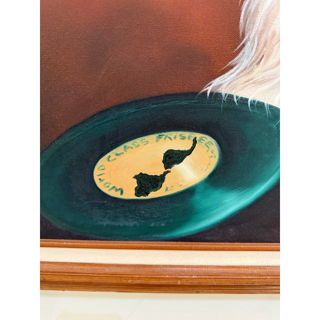 A really well done portrait painting of a dog, specifically a Bernese Mountain Dog, sitting with a frisbee that says world...