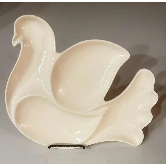 Pace, love, and candy dishes! This vintage ceramic candy dish/ catchall in the shape of a white dove has an inscription on...
